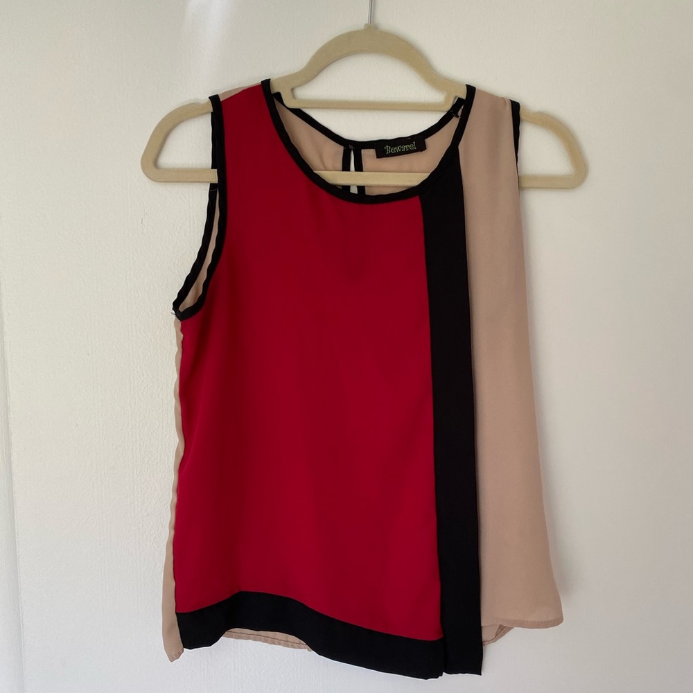 Asymmetrical sleeveless blouse
